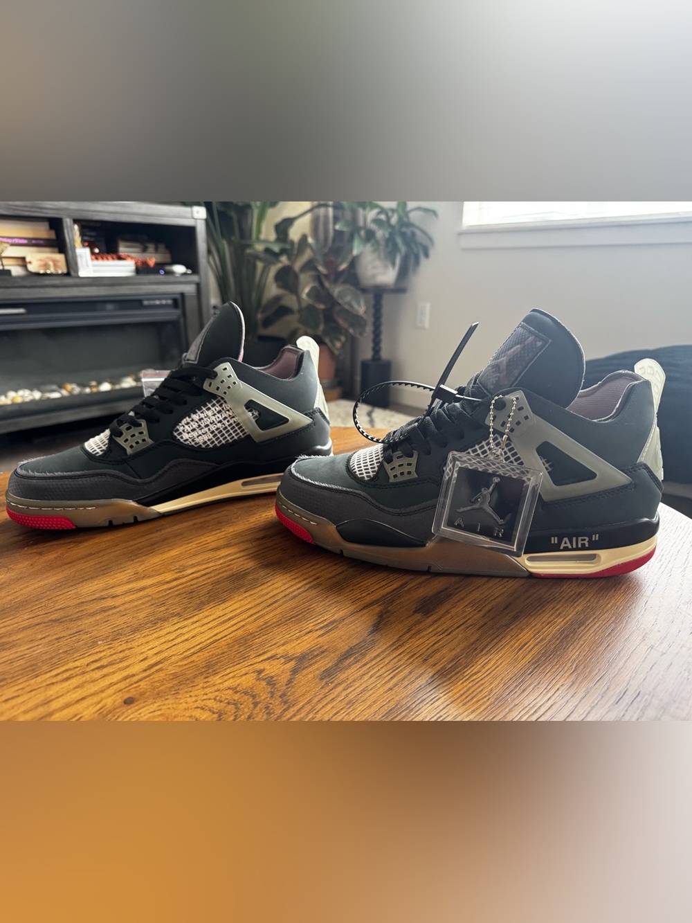 Air Jordan Sneakers. Men's 11 Black/Grey Basketball Sneakers with Red Accents